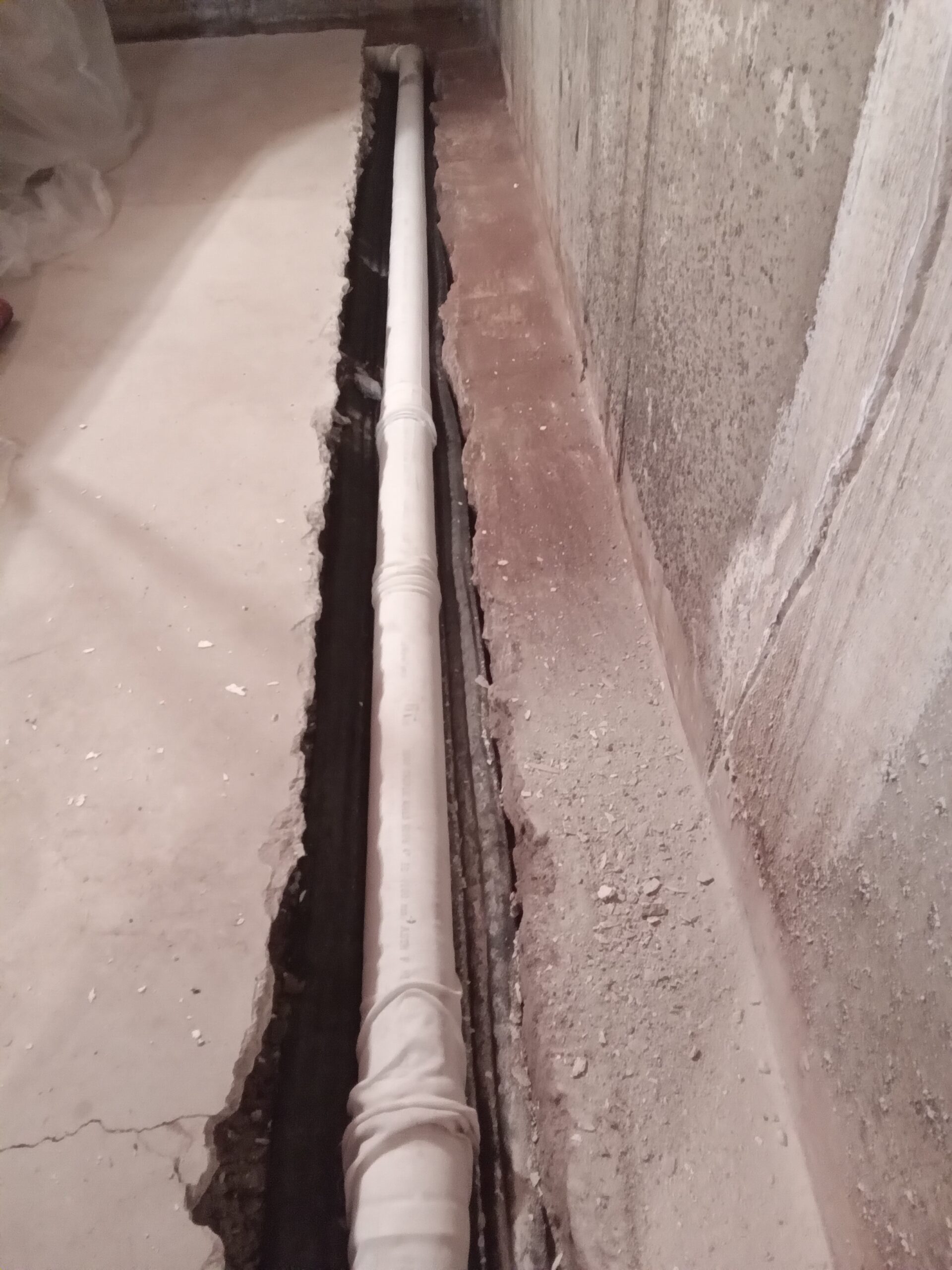 Drain pipe as part of a residential basement waterproofing in Snyder County PA.