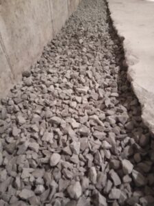 Drain trench is part of a commercial grade basement waterproofing in Columbia County PA.