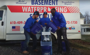 Our crew testing the drains that we use on basement waterproofing jobs like on this house in Glassboro NJ.