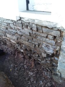Exterior of a basement waterproofing in Long Branch NJ. Fixing the external problem.