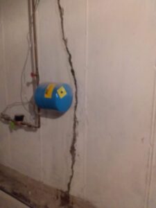 Walk crack repair during a basement waterproofing in Wilkes-Barre PA