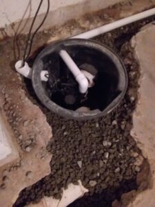 Sump pump drain for a York County PA basement waterproofing.