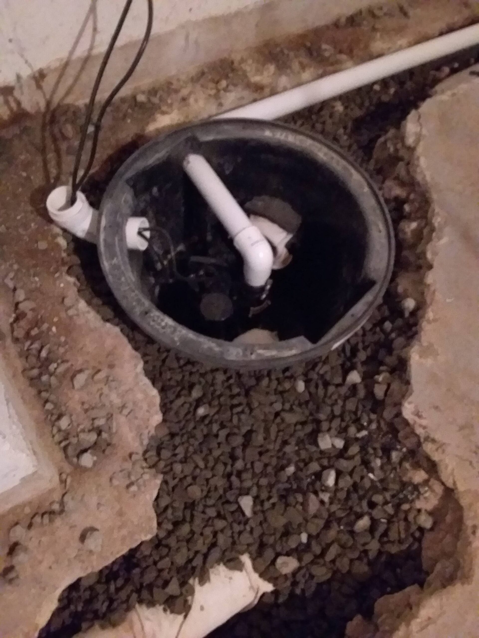 Sump pump drain for a York County PA basement waterproofing.