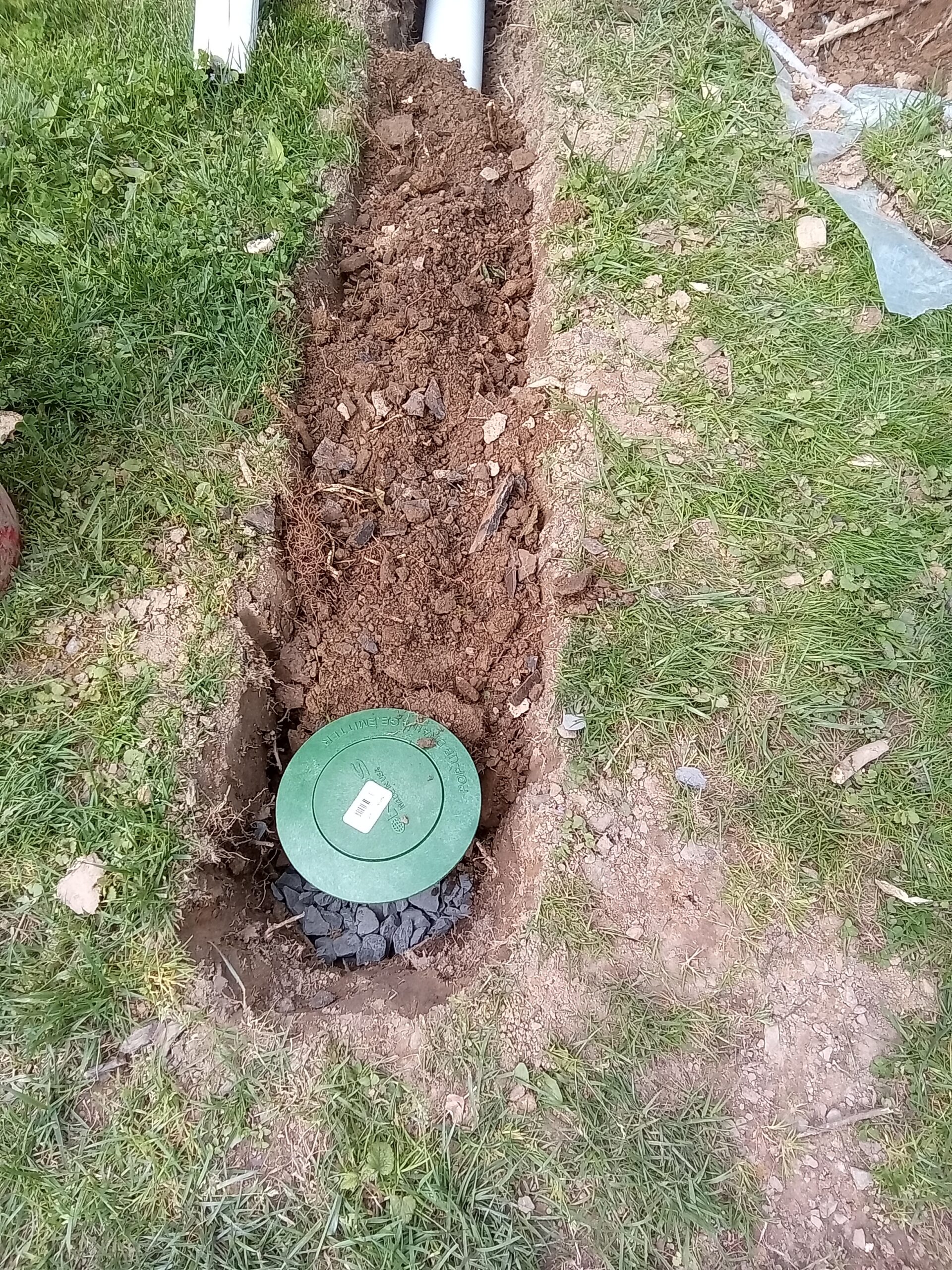 Yard drain line installed as part of a basement waterproofing in Bridgewater NJ.