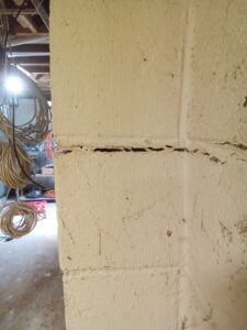 Cracked walls in this Sommerset County NJ home needed to be fixed as part of the basement waterproofing system.