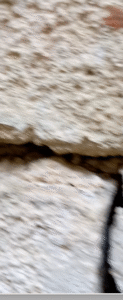 Severe cracks in the walls of this cellar needed basement waterproofing to fix in Warren County NJ.